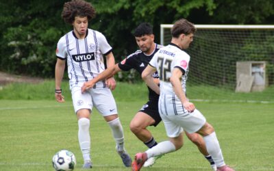 Zwei Teams im Regen